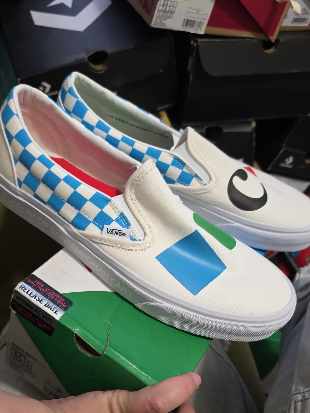 Vans Cream Slip-On Sneakers with Blue Checker & Multi-Color Graphics